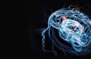 Ilustración de un cerebro luminoso sobre fondo oscuro, sobre la diferencia entre psicólogos y psiquiatras